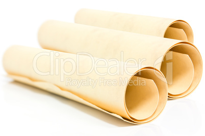 Scroll of old paper diplom isolated over white