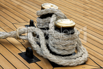 Ship interior, rope on old wood deck.