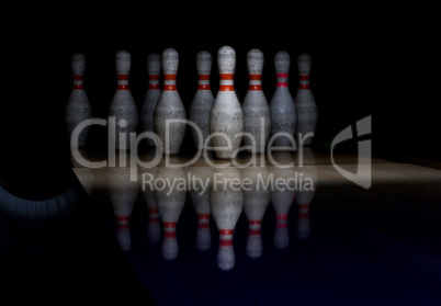 Bowling pins on wooden lane