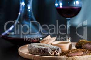 Meat fillet sausage and red wine