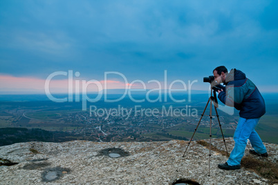 Photographer on top of mountain