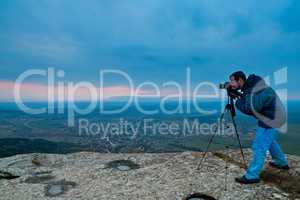 Photographer on top of mountain