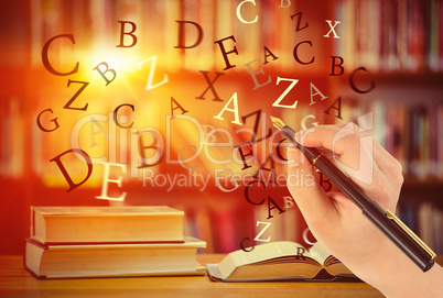 Composite image of businesswomans hand writing with fountain pen