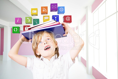 Composite image of cute pupil holding books