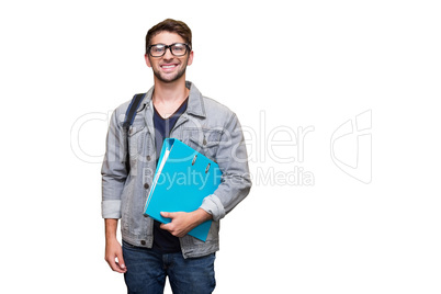 Composite image of student smiling at camera in library