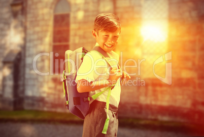 Composite image of cute pupil walking to the school bus