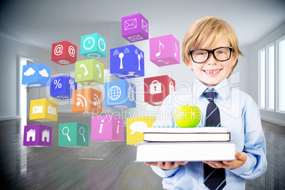 Composite image of cute pupil holding books and apple