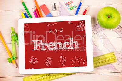 French against students desk with tablet pc