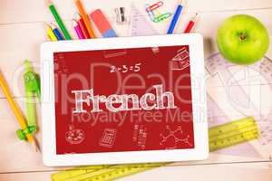 French against students desk with tablet pc
