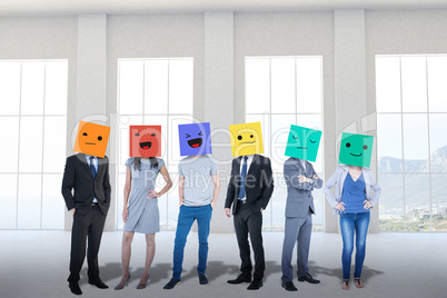 Composite image of people with boxes on their heads