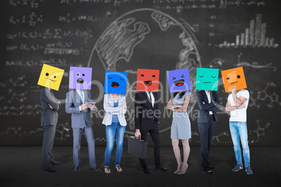 Composite image of people with boxes on their heads