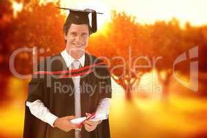 Composite image of man graduating from university