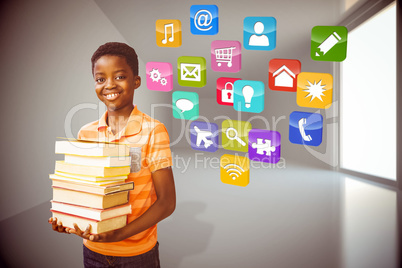 Composite image of portrait of cute boy carrying books in librar