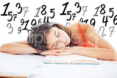 Composite image of sleeping student head on her books