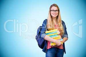 Composite image of pretty student in the library