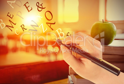 Composite image of businesswomans hand writing with fountain pen Composite image of businesswomans hand writing with fountain pen