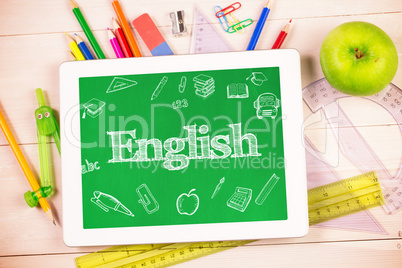English against students desk with tablet pc