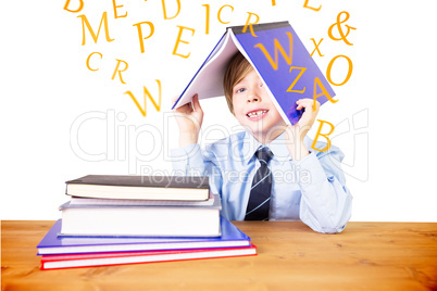 Composite image of cute pupil with books