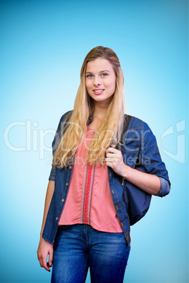 Composite image of pretty student in the library