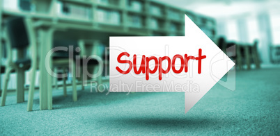 Support against volumes of books on bookshelf in library