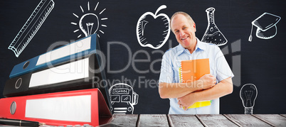 Composite image of mature student holding notebooks