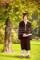 Composite image of student in graduate robe