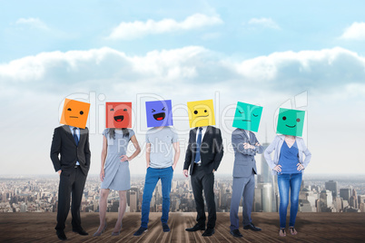 Composite image of people with boxes on their heads