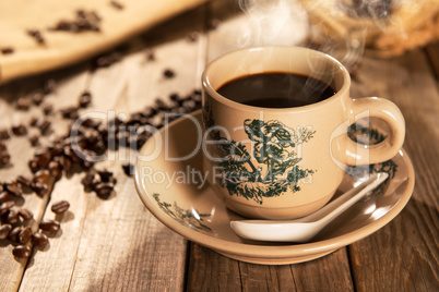 Traditional style Hainanese coffee in vintage mug