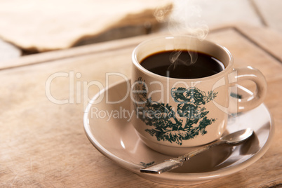 Traditional kopitiam style Nanyang coffee in vintage mug