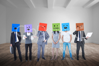 Composite image of people with boxes on their heads