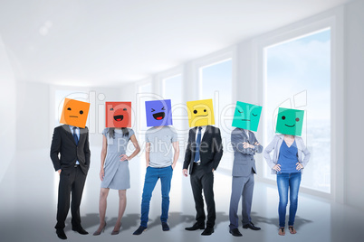 Composite image of people with boxes on their heads