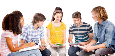 Composite image of college students doing homework