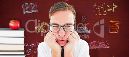 Composite image of geeky hipster falling asleep on hands