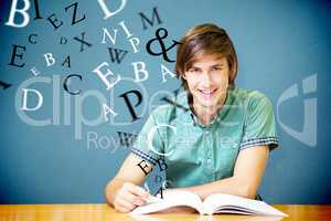 Composite image of student sitting in library reading