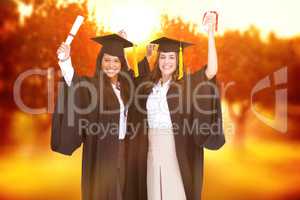 Composite image of two women celebrating their graduation