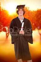 Composite image of smiling student in graduate robe