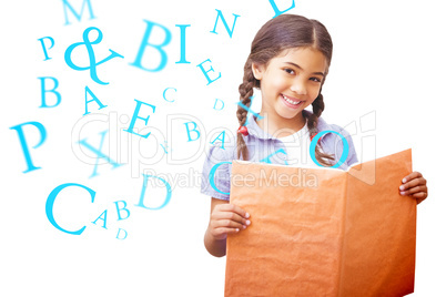 Composite image of cute pupil smiling at camera during class pre