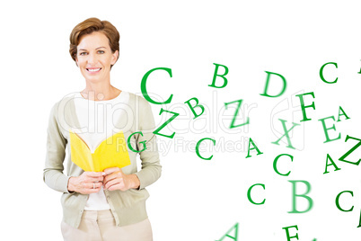 Composite image of teacher reading book at library