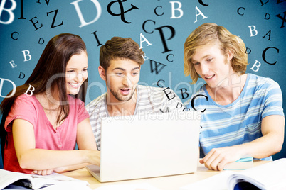 Composite image of college students using laptop in library Composite image of college students using laptop in library