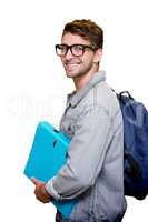 Composite image of student smiling at camera in library