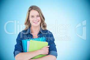 Composite image of smiling student holding notebook and file