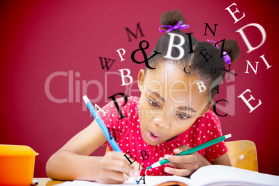 Composite image of cute pupil writing at desk in classroom