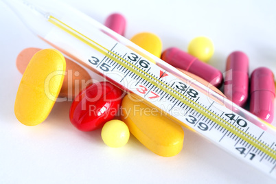 Pills And Thermometer