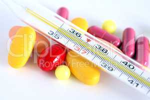 Pills And Thermometer