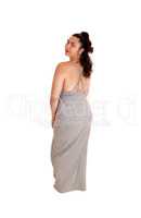 Beautiful woman in gray dress from the back.