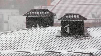 Daytime blizzard on the roofs
