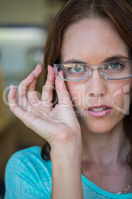 Woman shopping for new glasses