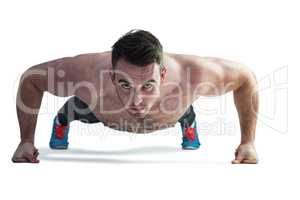 Strong bodybuilder doing press up