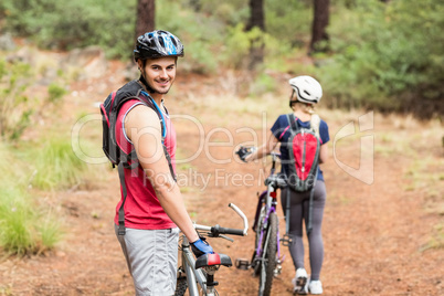 Handsome biker looking at the camera