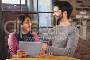 couple looking at the tablet